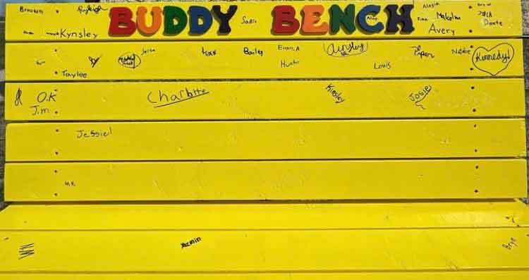 Younger students at ECS were invited to sign the buddy bench