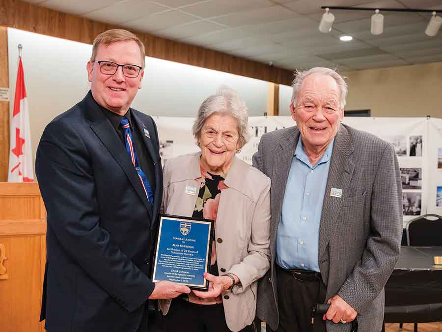 Interlake-Gimli MLA presented a plaque to Alma Sigurdson in honour of 70 years of volunteer service