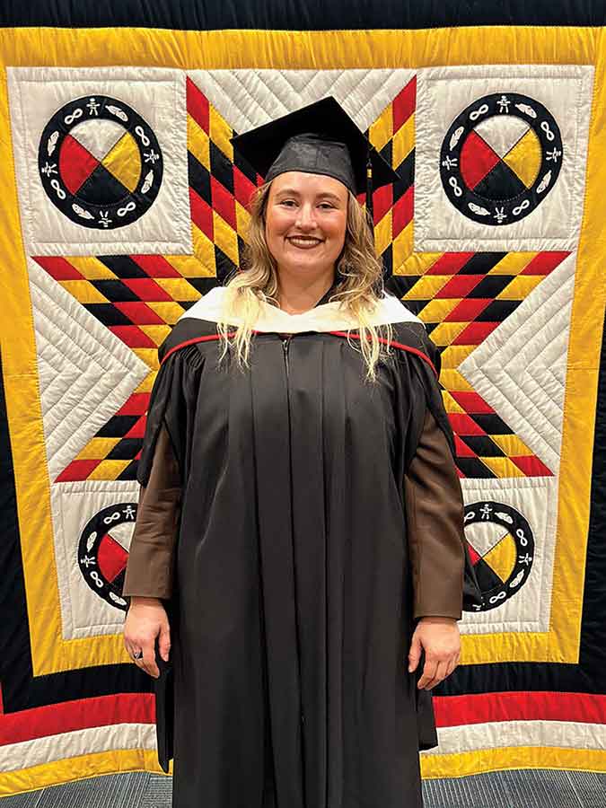 Chudd is this year’s valedictorian. Pictured is Chudd addressing the fall Class of 2025