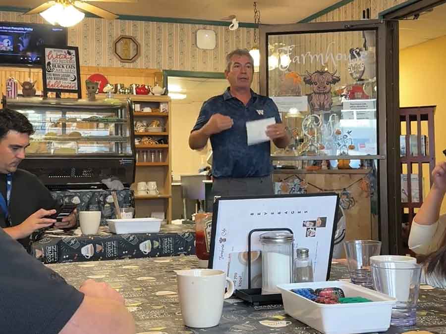Teulon Mayor Todd Campbell greets participants during the Manitoba Chambers of Commerce economic development tour on Oct. 29, welcoming visitors as they stopped in Teulon to learn about local business initiatives and community projects