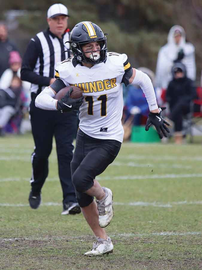 Jamie Dandeneau of Stonewall made key plays on both offence and defence to help lift the Interlake Thunder to a 37–36 win over the St. Vital Mustangs
