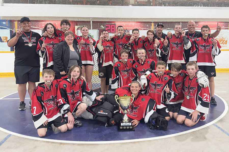 North Winnipeg Falcons U15 players celebrate their league championship victory