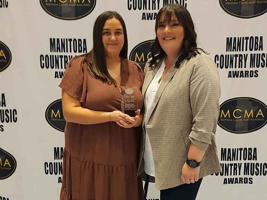 Kaylyn Edel and Taylor Braun with the Festival or Event of the Year trophy the Manitoba Stampede an Exhibition won at the Manitoba Country Music Association’s awards gala over the weekend