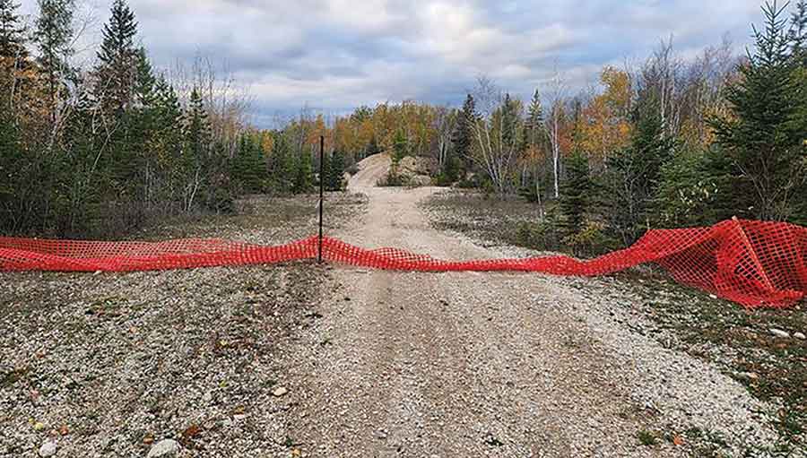Snow fences erected by Manitoba conservation to protect the garter snakes in spring and fall can fall down or be pulled down  by off-road vehicle drivers