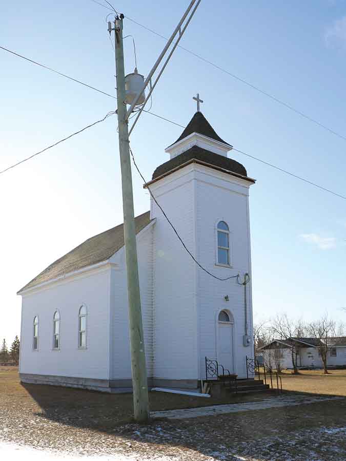 The Arnes Lutheran Pioneer Memorial Church is shown in 2019. The church sits at the junction of PR 222 and Arnes Road. It was built in 1910 and moved to its present site in 1920. The RM of Gimli designated it a heritage building and heritage site in 2009 (Bylaw No. 09-0010). The RM’s Municipal Heritage Advisory Committee passed a resolution in 2019, stating the church is an important heritage site in Arnes