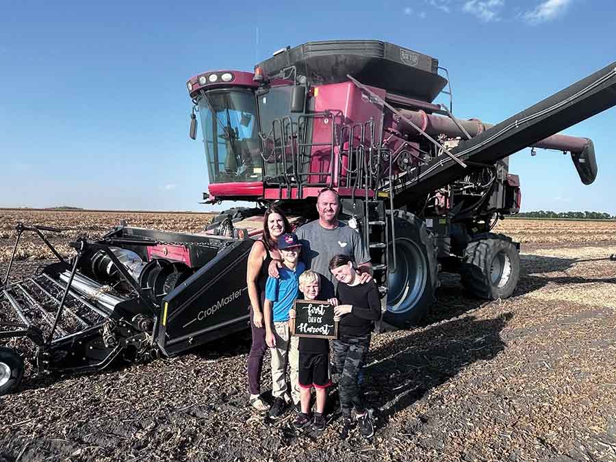 Russell Prairie Market grows, harvests, prepares and packages black and pinto beans on their family farm in Carman before selling them in Manitoba grocery stores and to international customers. The Russell family — Heidi, Tyler, Blake (10), Rhett (6) and Hanna (9) — pictured during the first day of this year’s bean harvest