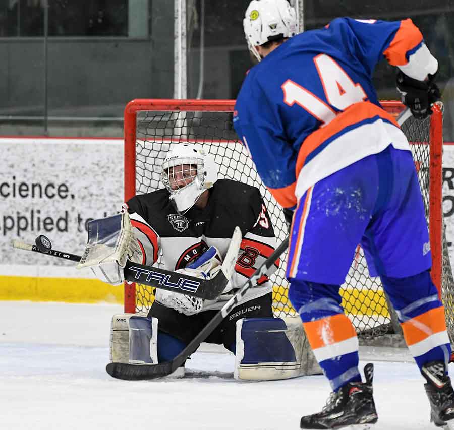 Morden Bombers netminder Aaron Brunn makes a blocker save on the close in shot by Portage’s Jared Roy in last Friday’s game, which the Bombers won 5-4 in overtime