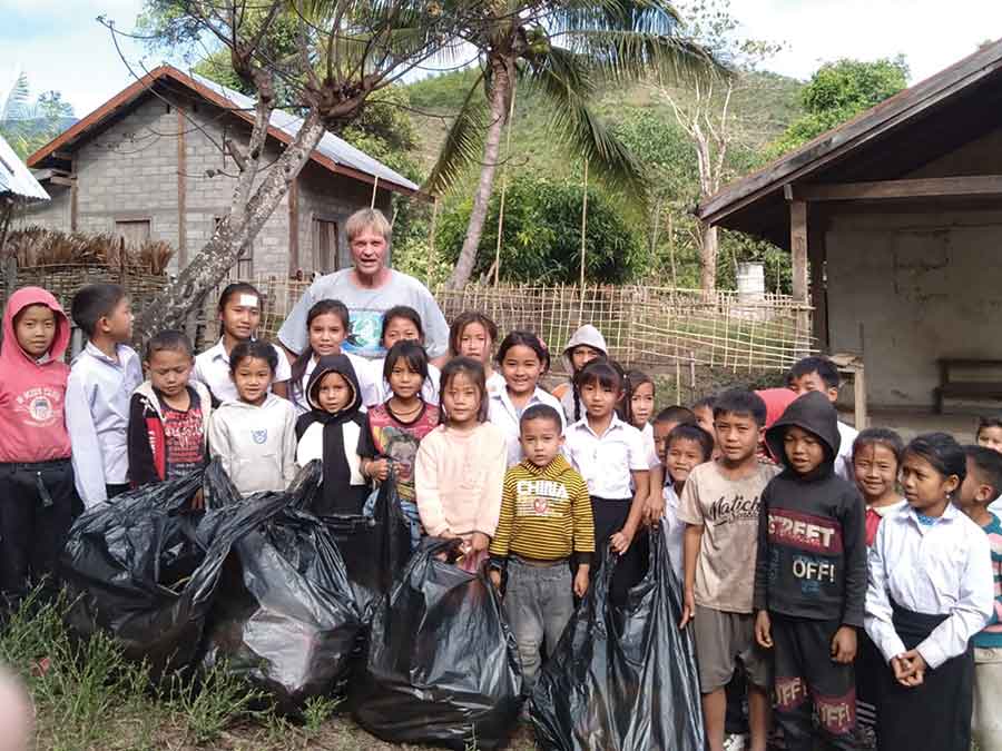 The Flag of Humanity founder Bruce Benson visited Laos late last year to deliver his message of human unity and environmental stewardship