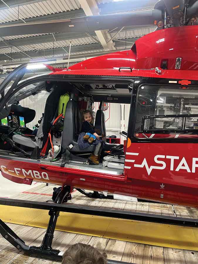 Robyn got to climb inside the helicopter and see the equipment paramedics use