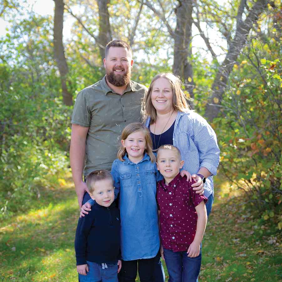The Friesen family — Tyler, Jessica, Judah (4), Sarah (8) and Titus (6) — enjoys spending time together outdoors near their home in Carman