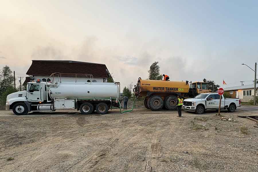 Sigfusson Northern construction teams, along with JNR Construction and 311Sig, are supporting wildfire relief efforts in Cross Lake and Lynn Lake by providing shelter for evacuees and firefighters, and using heavy equipment to create firebreaks