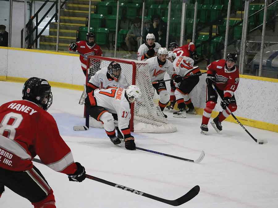 Steelers forward Landon Pue looks to make a pass to teammate Carter Haney