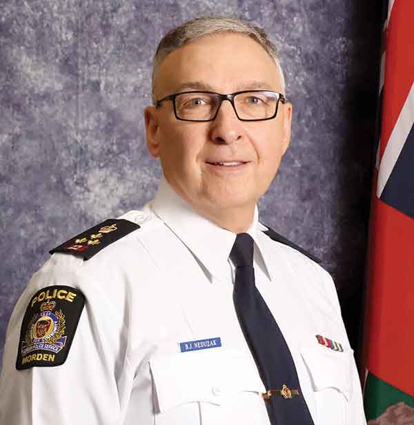 Brad Neduzak began his career in policing in 1985, and he was appointed chief in 2000