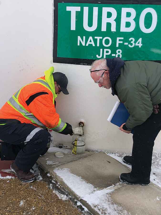 Ross, right, completing a quality assurance audit in Moose Jaw in 2023. He currently works as a quality assurance representative with the Department of National Defence