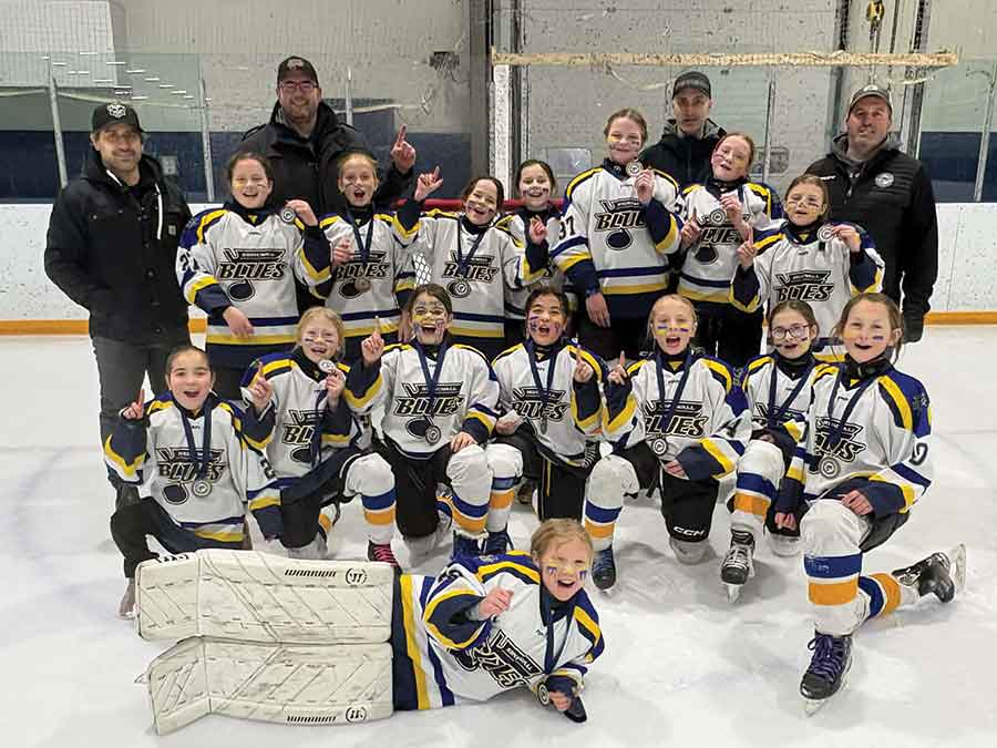 The Stonewall Blues U11A2 captured the Stonewall tournament title with a 2–1 win over the Winkler Flyers on Jan. 18. Pictured, from left, back row: Johnny Lazo (coach), Annika Marohn, Lance Marohn (coach), Kaleah Wutzke, Janey Gemmill, Callie Davis, Hannah Corrigal, Brian Davis (coach), Scarlett Campbell, Rowyn Findlay and Matt Wutzke (coach). Front row: Tenley Lazo, Livie Chatfield, Esmae Chartrand, Emilia Lazo, Brooke Vodden, Gracie Bergen, Devon Hueging and Reese Maxwell (goaltender)