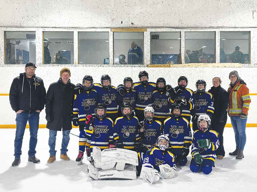The Stonewall Blues U13A2 defeated the MacDonald Lightning 6–3 to claim bronze at the Stonewall tournament on Jan. 18. Pictured from left, back row: Justin Walld-Walton (coach), Scott Marohn (head coach), Paisley Erickson, Katie Marohn, Nora Rasmussen, Quinn Enstrom, Donni Hunt, Lucy Sigurdson, Eva Coutu, Shelby Rasmussen (coach) and Lisa Pizzi (coach). Front row: Brynn Lee, Peyton Marohn, Jorja Gervin, Olivia Tucker and Lily Fung. Goaltender: Bay Walton. Missing from the photo: Danica Klassen, Blair Cain and Elli Turcan