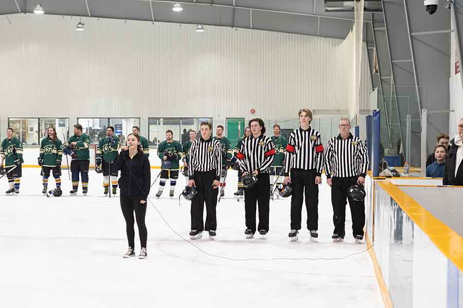 Former WCI student Shalene Varnes sang O’Canada. Referees left to right: Ethan Corbett, Leland Chartrand, Crew Corbett and Geoff Corbett