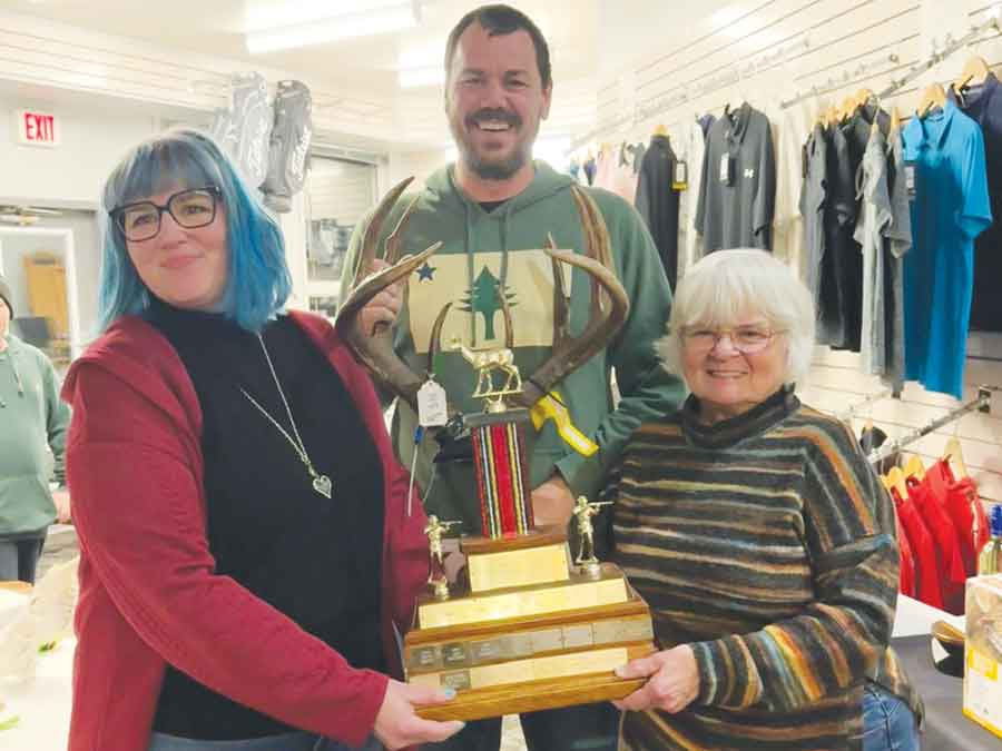 Pauline-Emerson Froebe (presenter), Jason Rheault (winner of the Giesbrecht Trophy for first place in the largest rifle season deer category and largest overall, 148 3/8 inches), and Evelyn Froebe (presenter) are pictured during the Carman & District Game & Fish Club’s annual banquet held Jan. 24, which drew a sell-out crowd of hunting and fishing enthusiasts