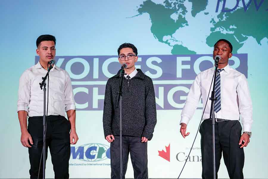 Fawwaz (Ali) Al Hassan, Sami Suliman and Tobilola (Tobi) Olorunsola perform a spoken-word piece during the Manitoba Council for International Cooperation’s launch of International Development Week at the Manitoba legislature