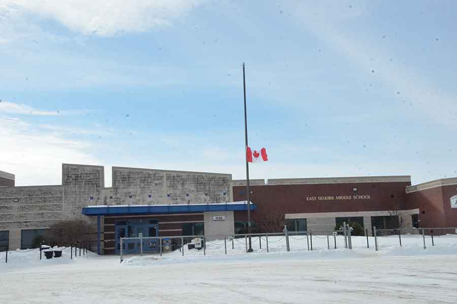 East Selkirk Middle School with flag at half-mast