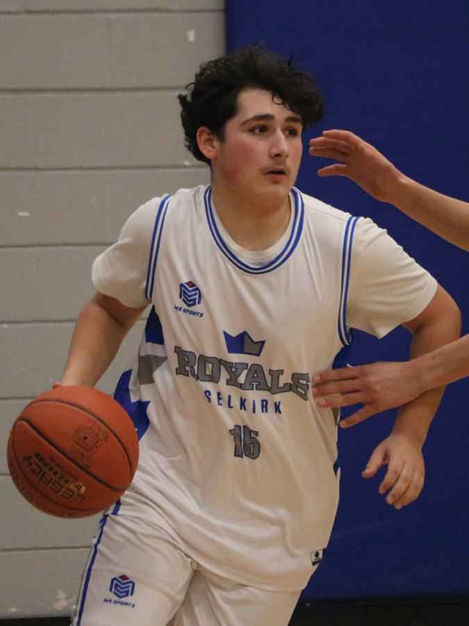 Lord Selkirk’s Noah Wall maintains possession against the Calvin Christian Eagles last Thursday
