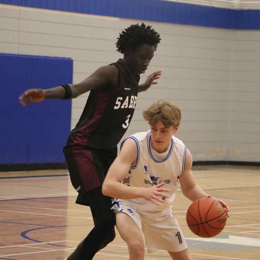 Lord Selkirk’s Hudson Kennelly is guarded by a Springfield Sabres defender in Wednesday, Jan. 28’s Royals home game. Kennelly and the Royals went on for a 78-59 win and improved to 4-3 on the season