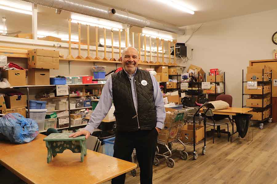 Altona MCC Gift & Thrift Store manager Dave Rempel in the new sorting and pricing space set up in the rear of the building