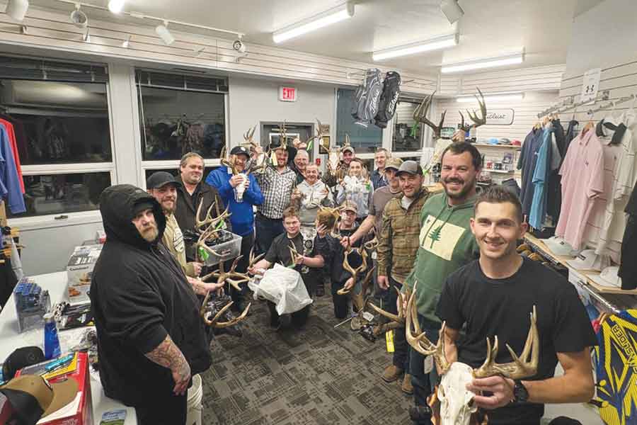 Big game entries are displayed for a group photo