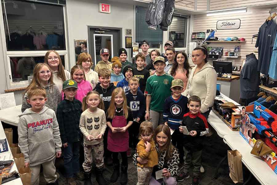 Young attendees pose for a group photo during the Carman & District Game & Fish Club’s annual banquet