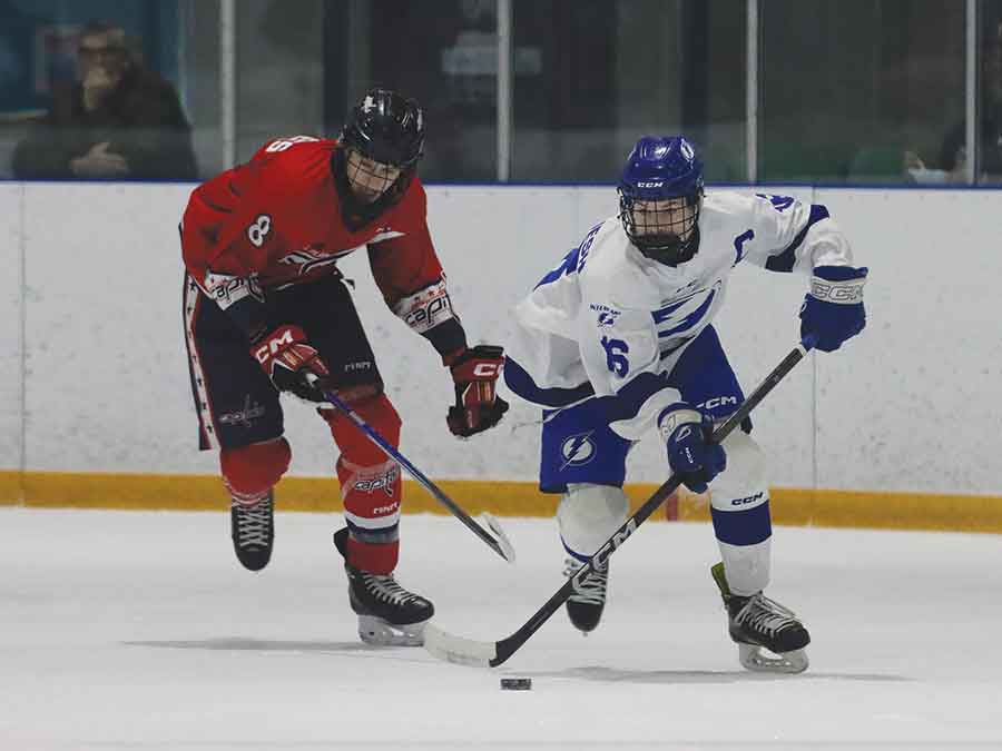 Interlake Lightning captain Maddyn Dalgleish carries the puck up ice during league action against the Capitals at Stonewall VMSC on Saturday