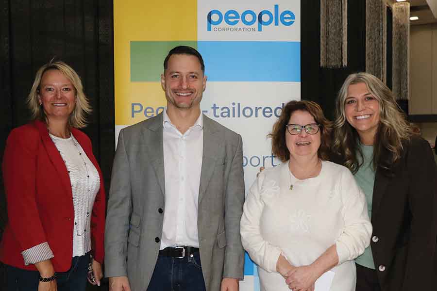 Tracy Dandeneau (far left), Jeremy Dick, and Gabrielle Konowalchuk (far right) from People Corporation with Katie Cares’ Ruth Reimer at a wine and cheese event held in the charity’s honour last week