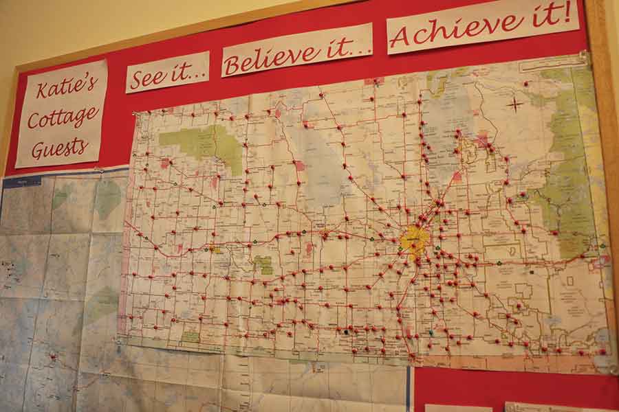 Thousands of people from all across Manitoba and beyond have stopped by Katie’s Cottage while their loved ones receive care at the nearby Boundary Trails Health Centre. Each pin represents a community a guest calls home
