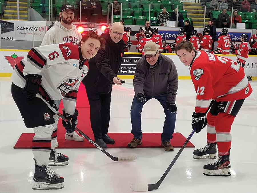Selkirk Steelers Business Manager Mitch Beaudin, Virden player Ty Plaisier, Aaron Hoium of Aaron’s No Frills, Selkirk Mayor Larry Johannson, and Steeler Owen Branson at puck drop