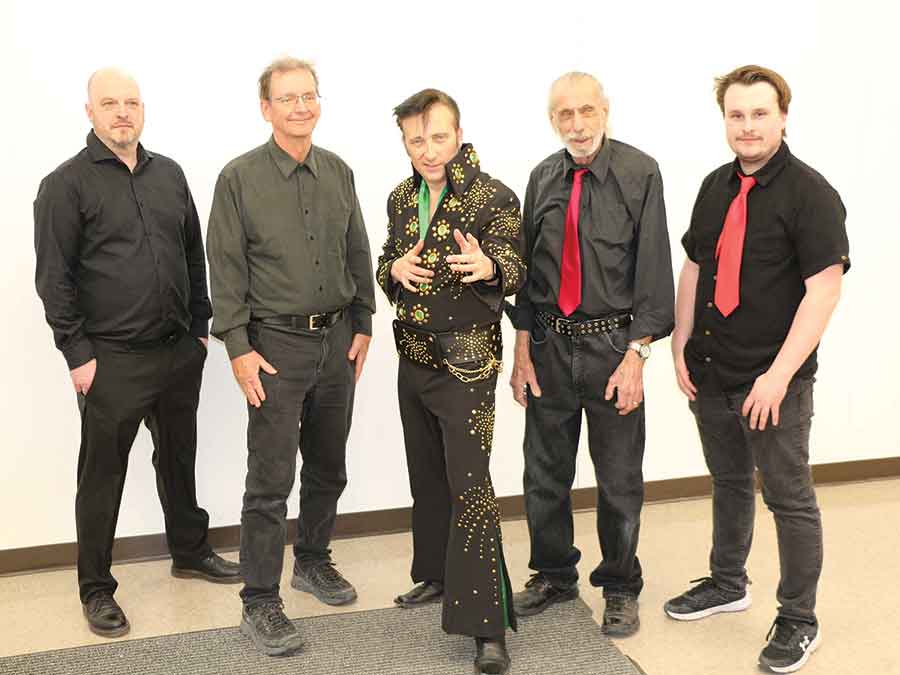 Adam T. Elvis (middle), also known as Adam Tarnowski, performs with his four-piece band during the Moosehorn Community Club fundraiser held March 14 at the Moosehorn Centennial Hall. The group entertained the crowd with classic hits from Johnny Cash, Johnny Horton and Elvis Presley