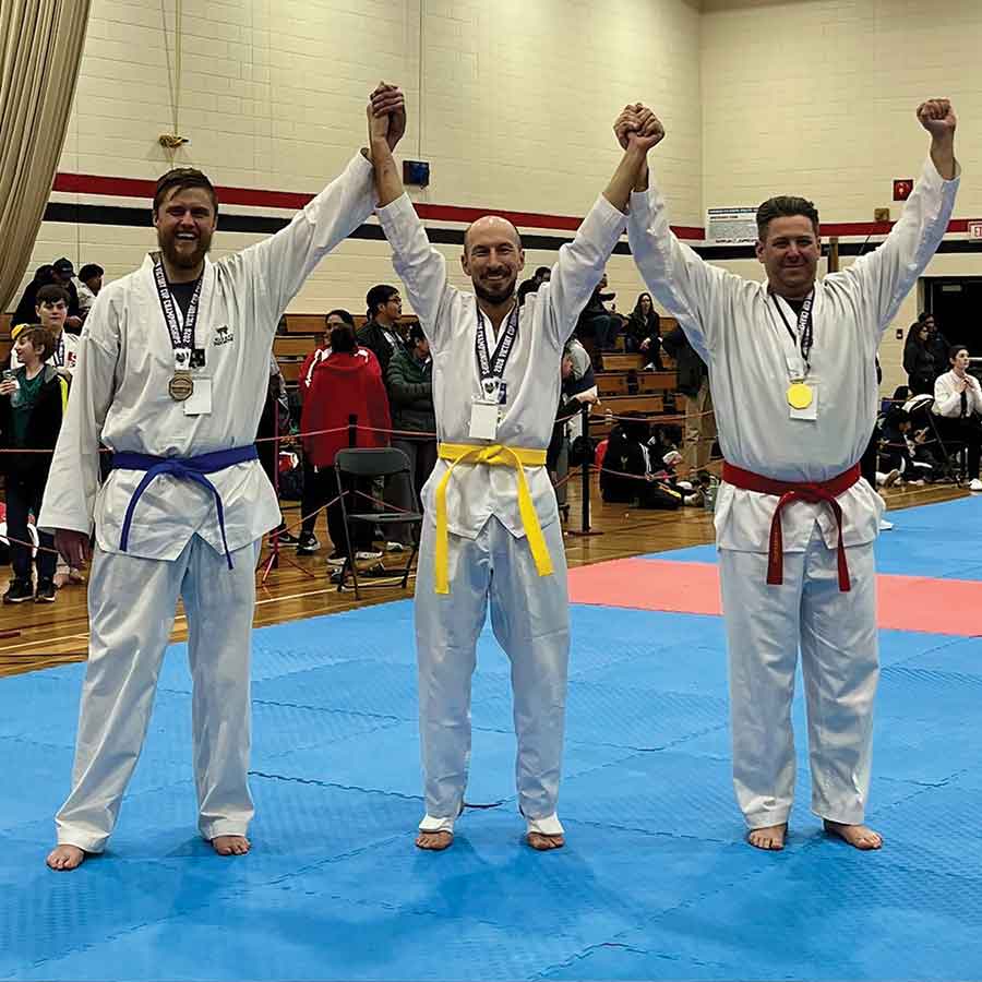 Clint Enns, Bronze Medallist for Sparring (left)