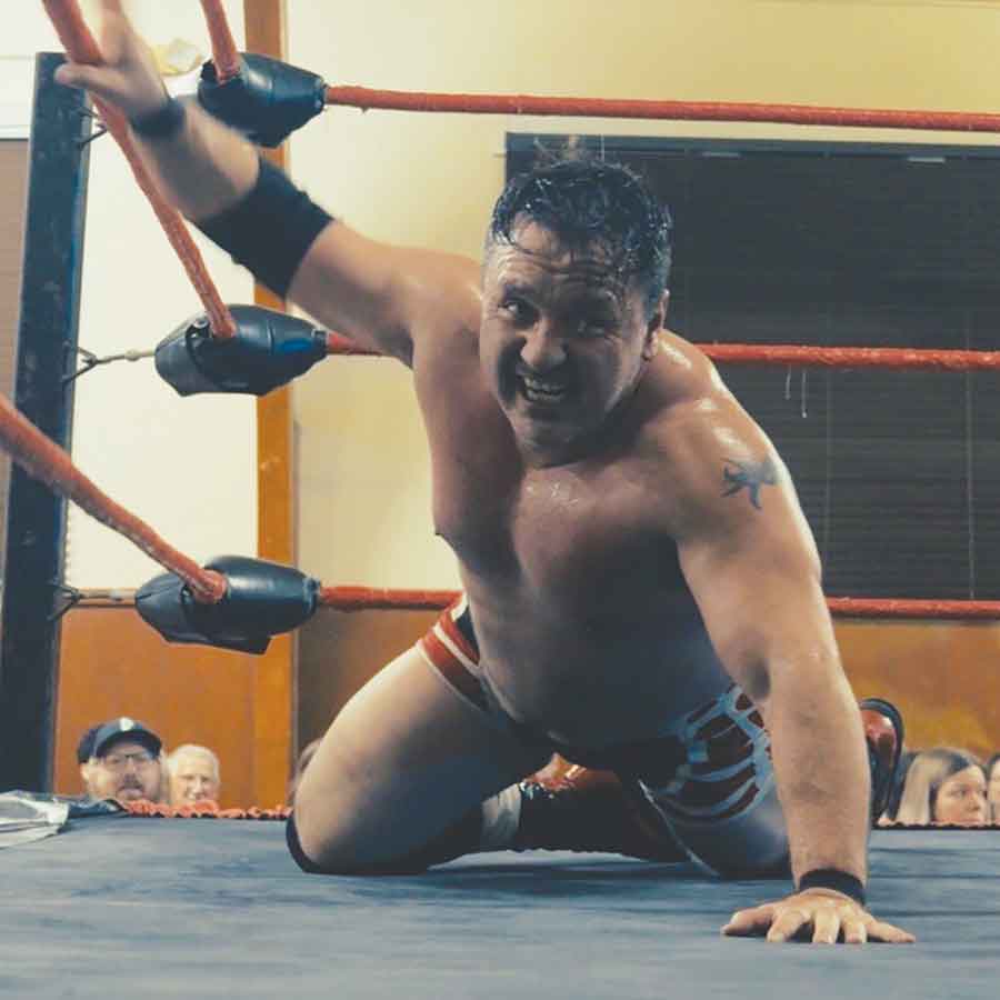 Evans combined signature spine buster, widow maker, and flying top role elbow drop moves in his defeat of “Hotshot” Danny Duggan