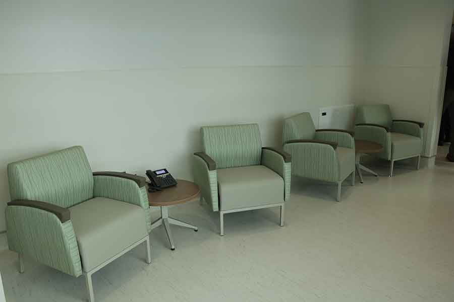 The two-storey building also includes both public and private gathering spaces for family and other visitors