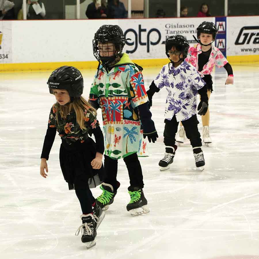 CanSkate skaters dressed for beach season