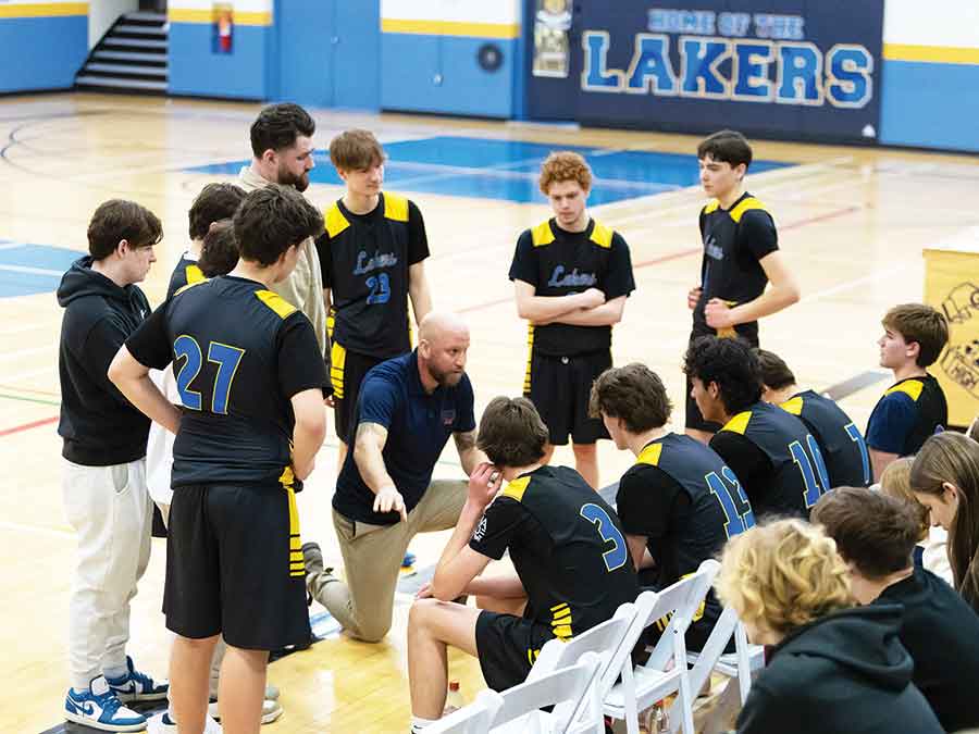Lakers’ coach Chad Heminger calls a time out during the game against the Carberry Cougars