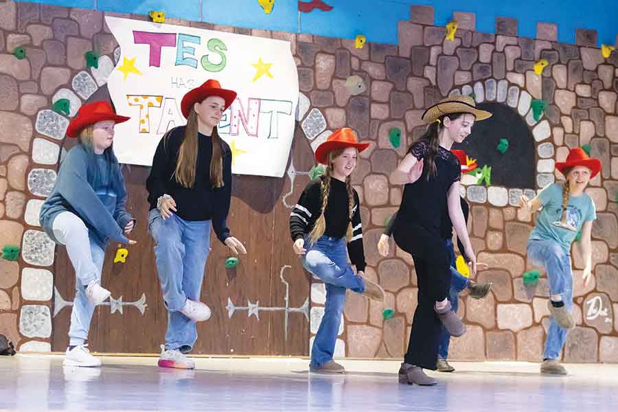 Grade 6 student Addy, along with friends Callia, Jocelyn, Lily, Sadie and Grade 5 student Colbie, dance to Cotton-Eyed Joe
