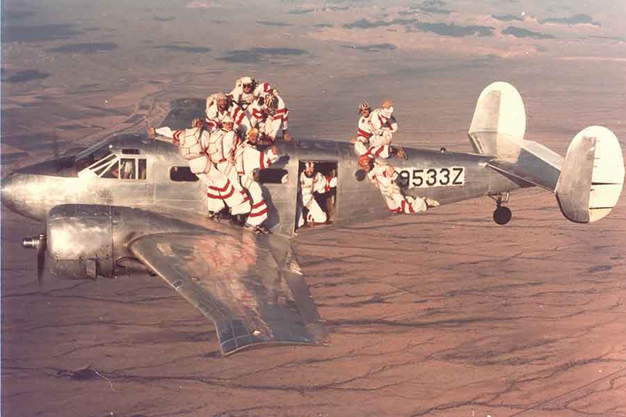 The 1977 Canadian Team 12,000-feet above Casa Grande, Arizona. Smith is is the very front on the wing