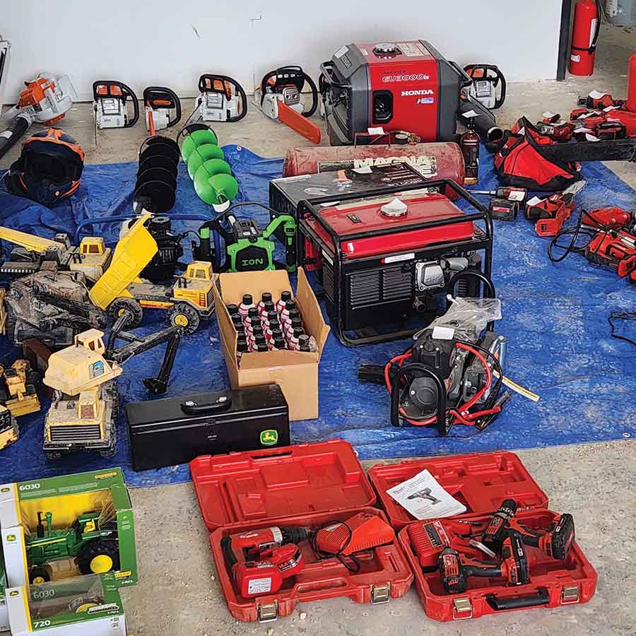 Recovered stolen property, including a John Deere tractor and other equipment seized during a March 30 search warrant in the RM of Rockwood, is shown