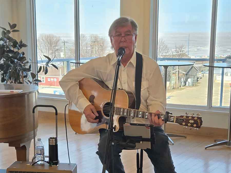 Blair Didychuk provided vocals and guitar entertainment for guests during the fashion show