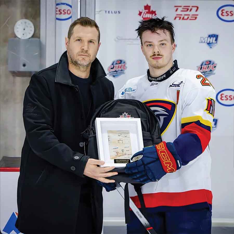 Hayden Wheddon receives a game star award following the Niverville Nighthawks’s 7-6 round-robin victory over the Rockland Nationals at the 2026 Centennial Cup in Summerside, P.E.I. Wheddon scored twice and added two assists in the win