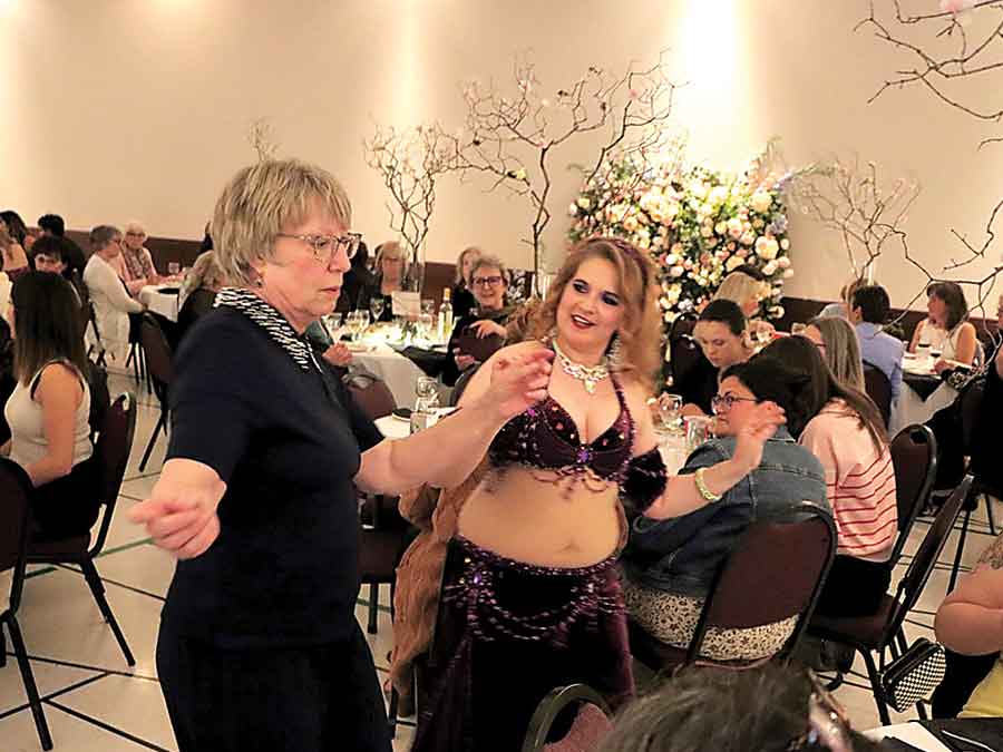Guests laugh, dance and take part in the Boyne River Keepers fundraiser at the Carman Active Living Centre on April 25, which drew about 130 attendees in support of local conservation efforts