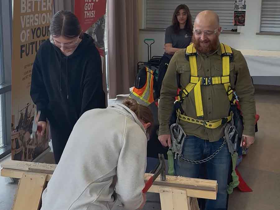 Grade 8 students test their hammering skills