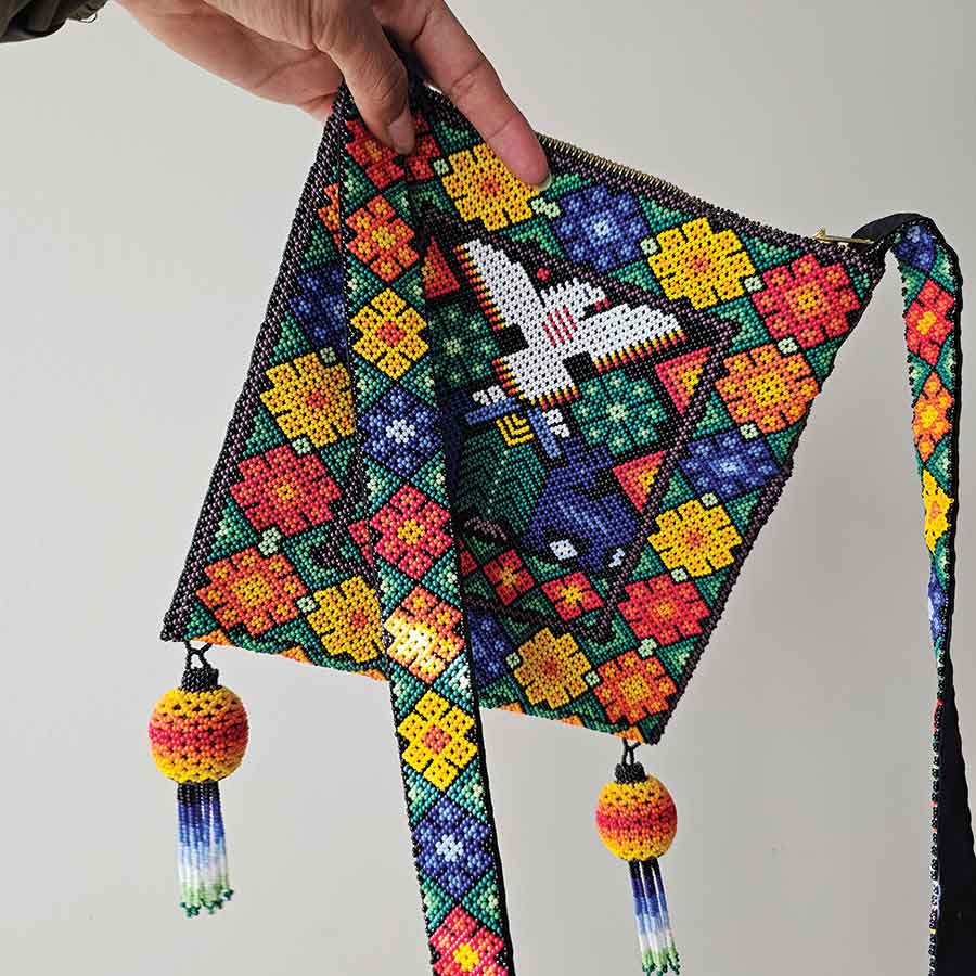 Morales sells hand-beaded jewellery and handmade bags