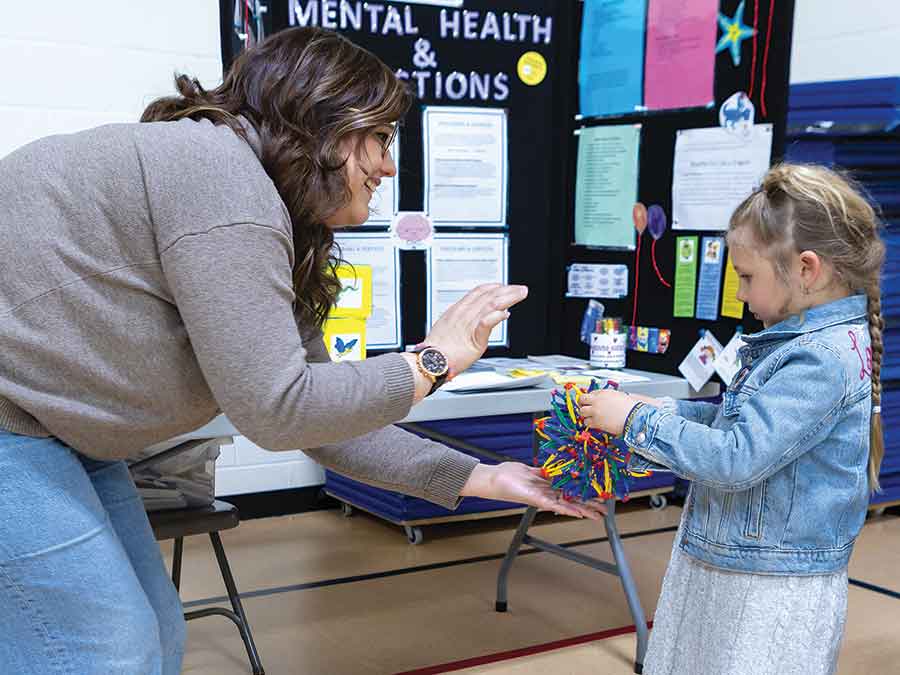 Lovella Bolun tries out sensory activities used for mental health self-regulation