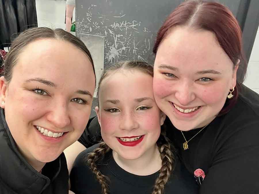 Lucy’s mom, Alycia, stands with Lucy and her aunt Elena, who co-choreographed the Pryvit