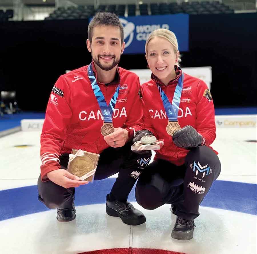 Colton Lott and Kadriana Lott pose with their bronze medals after representing Canada at the 2026 ACE & Company World Mixed Doubles Curling Championship in Geneva